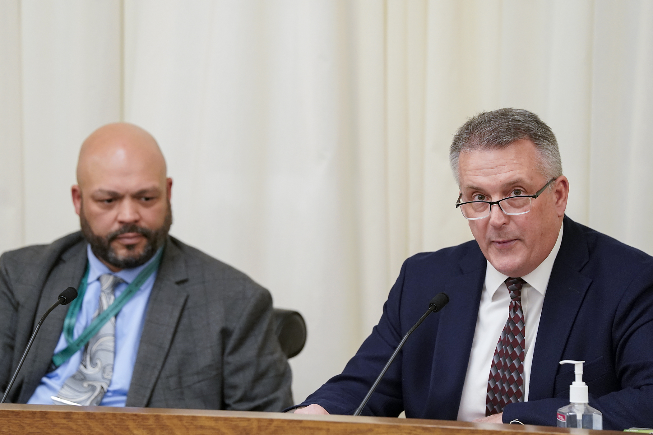 Dave Zimmer, right, policy fellow at the Center of the American Experiment, speaks to the  House Public Safety Finance and Policy Committee Wednesday in support of HF3380. The bill is sponsored by Rep. Walter Hudson. (Photo by Michele Jokinen)